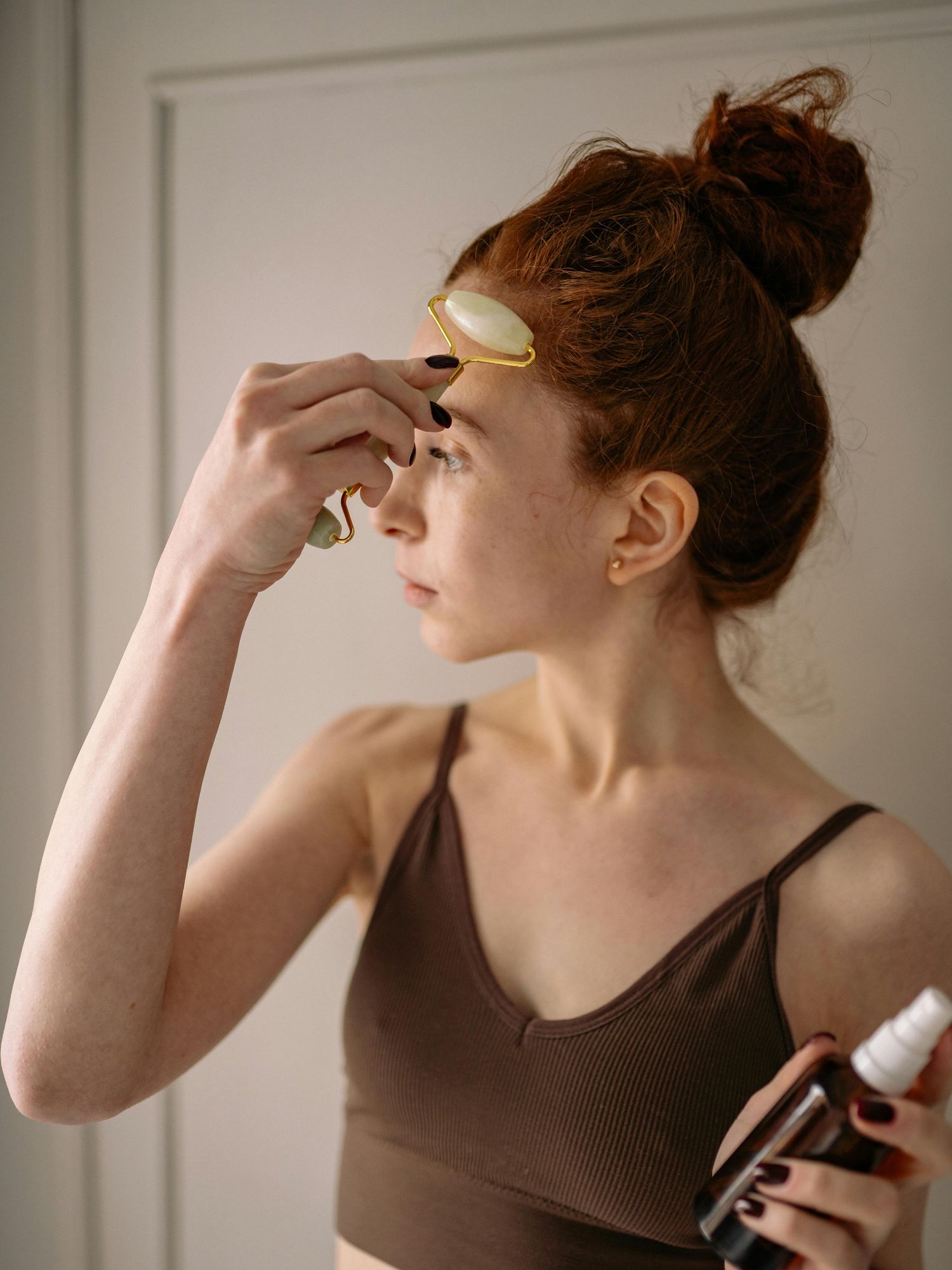 woman using ice roller