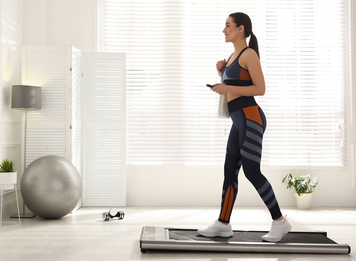 Woman walking on treadmill