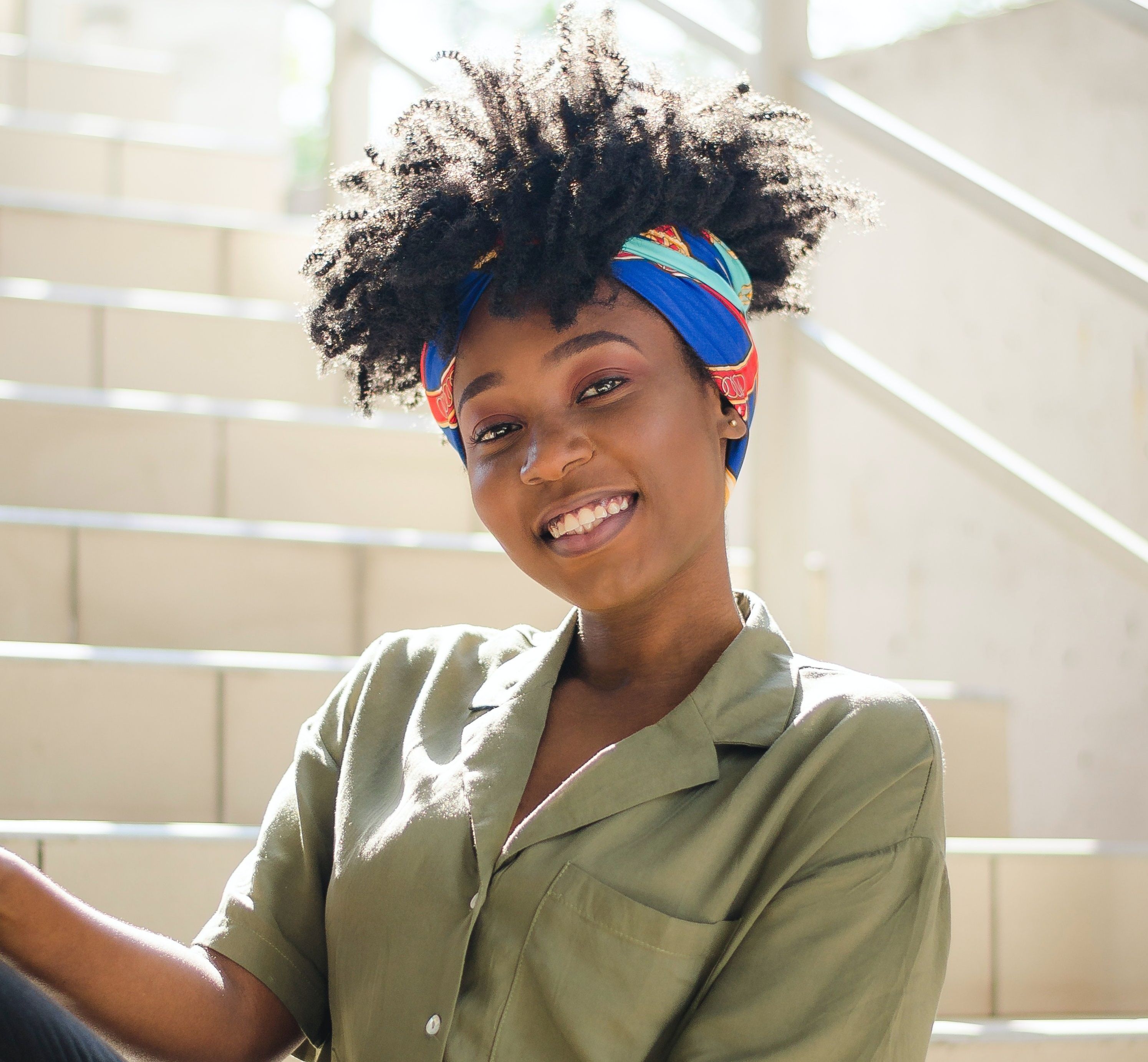 woman wearing a bandana as a hair tie or headband