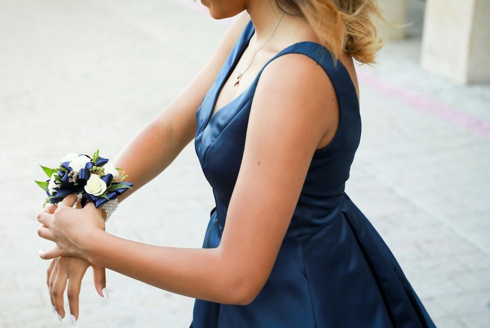 woman wearing a corsage