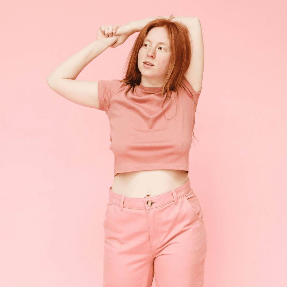 Woman wearing a full Millennial pink outfit