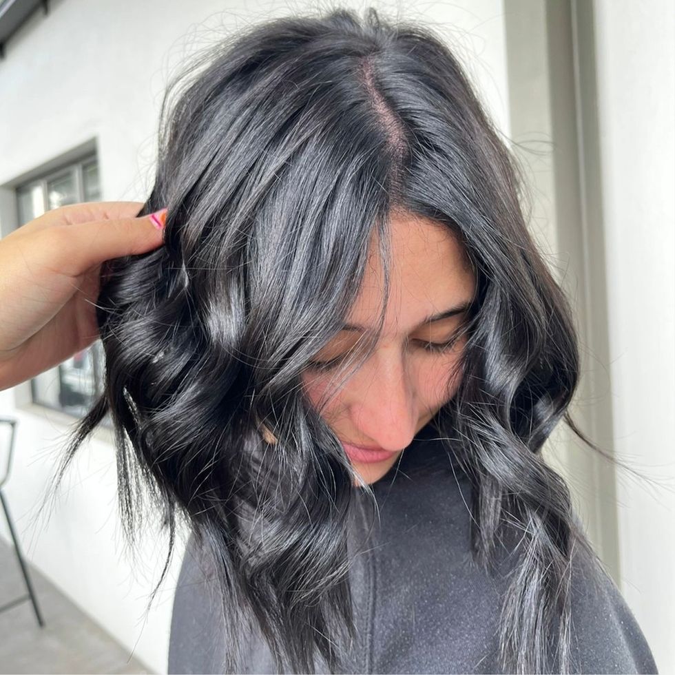 woman with black hair at the salon