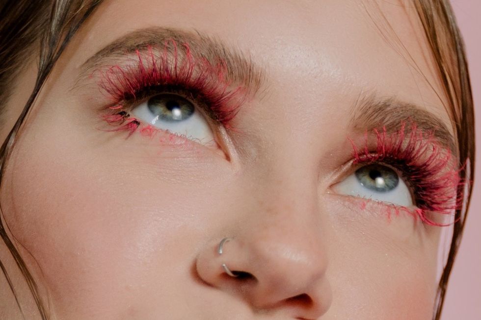 woman with pink mascara on