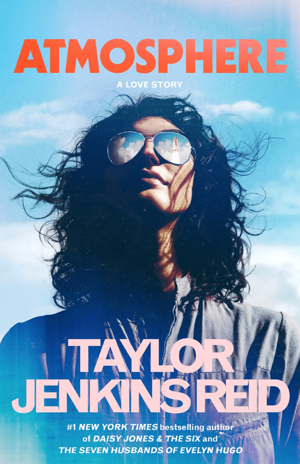 Woman with sunglasses reflects sky; "ATMOSPHERE" book cover by Taylor Jenkins Reid.