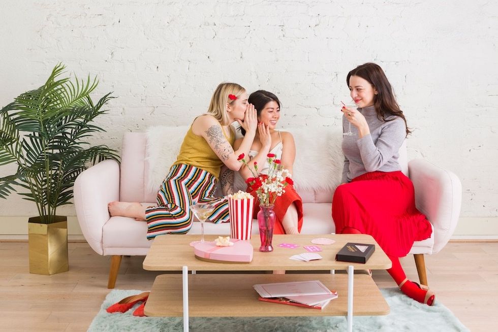 women talking on the couch