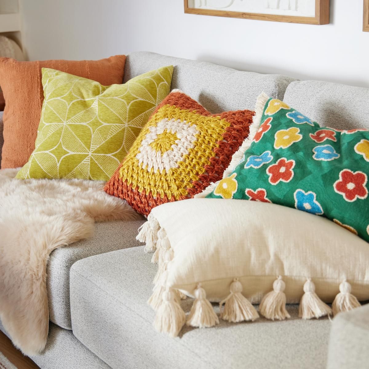 world market spring decor for 2023 colorful floral pillows