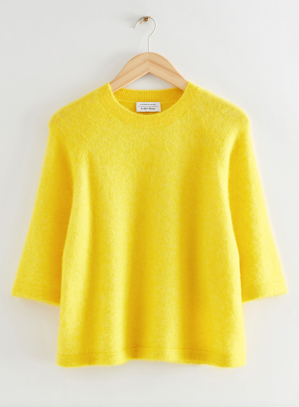 yellow sweater