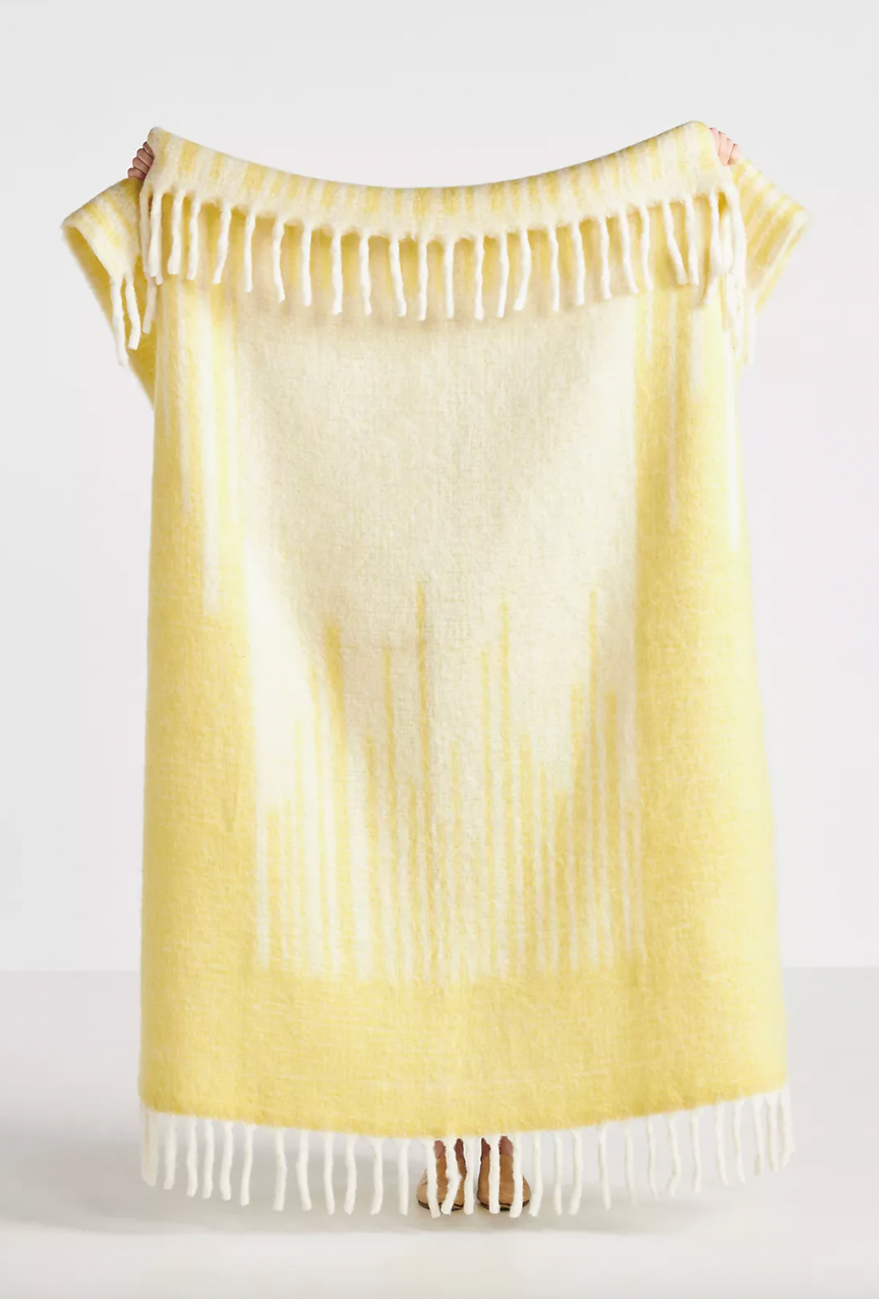 yellow throw blanket