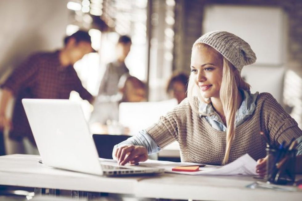 Young woman laptop in office